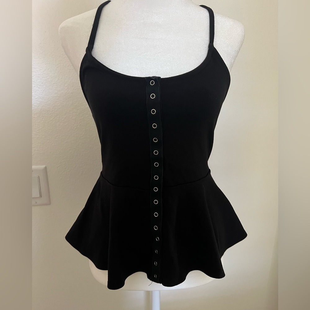 Black peplum top. Size S